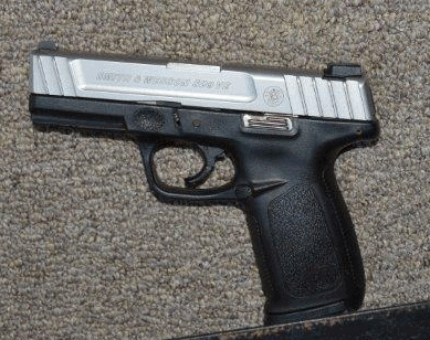 Police officers recovered a loaded 9mm semi-automatic handgun that was stolen
