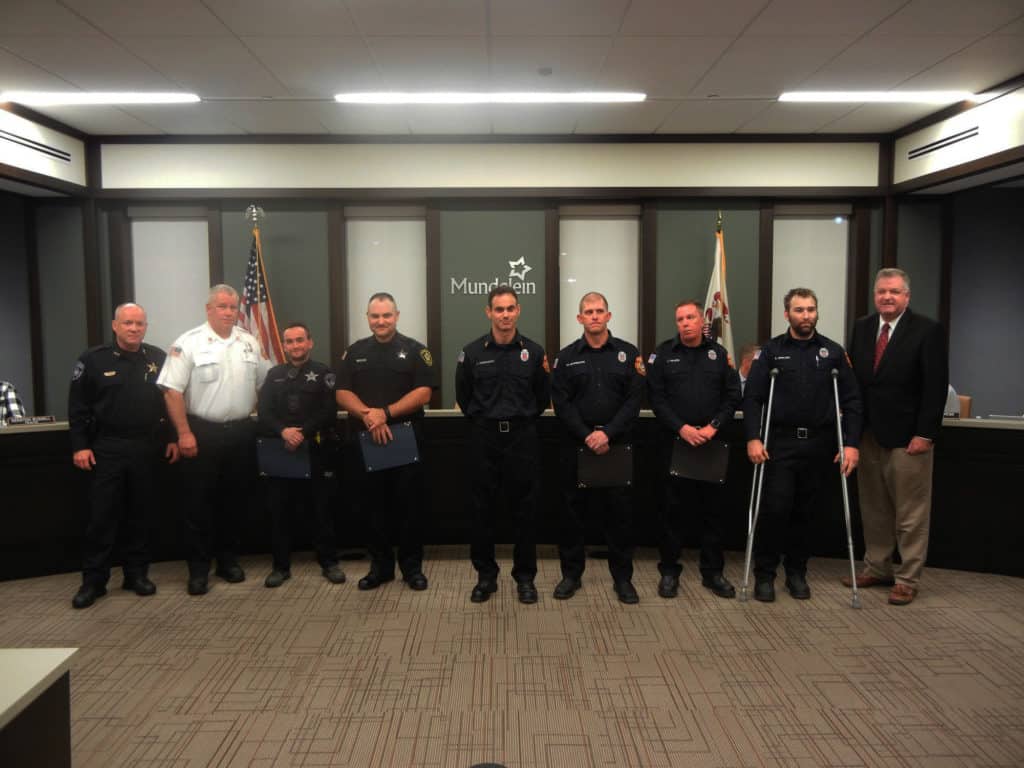 Police officers, paramedics honored for saving 15-year-old boy shot in ...