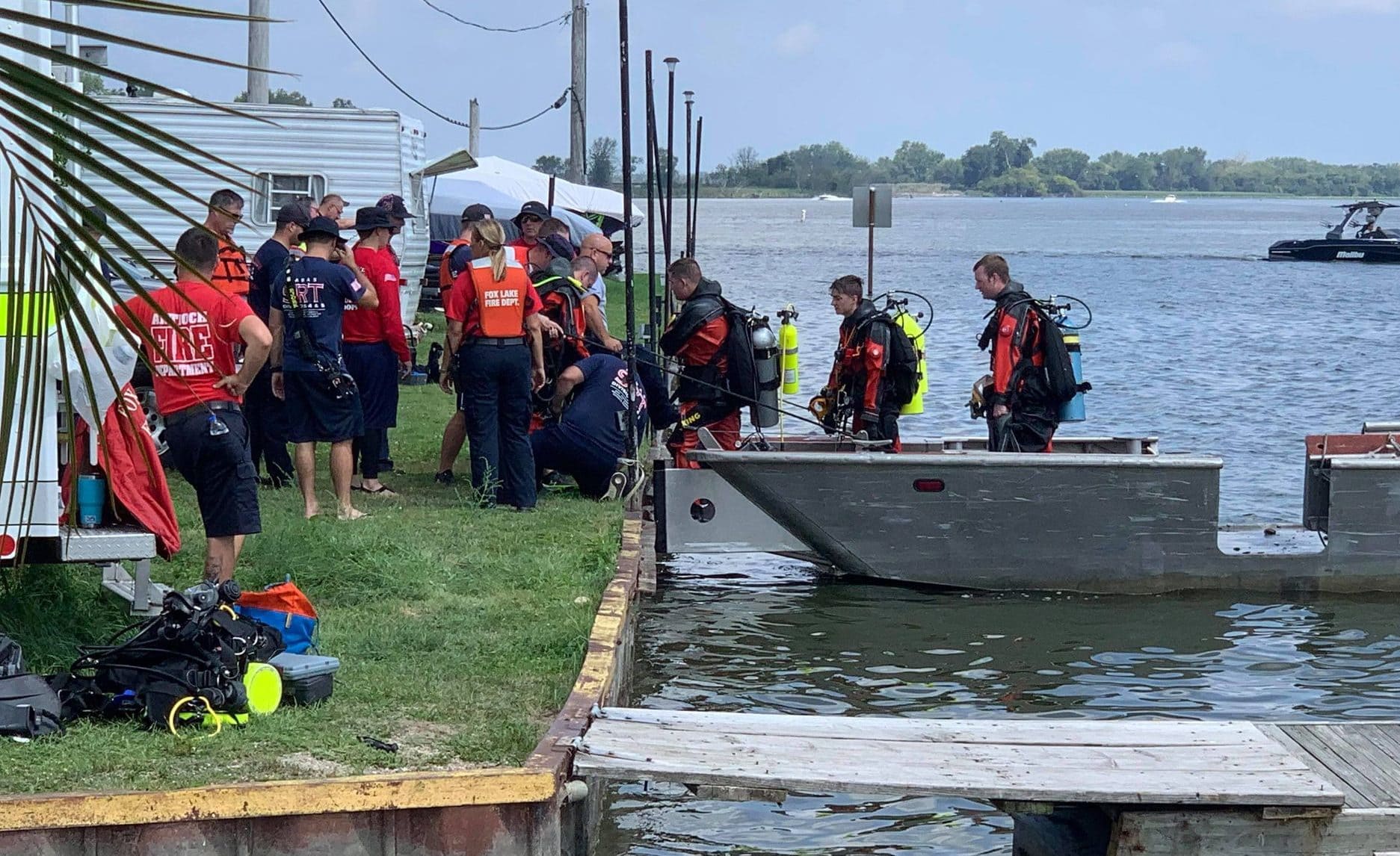 Dozens of fire departments assisting in search for swimmer who went