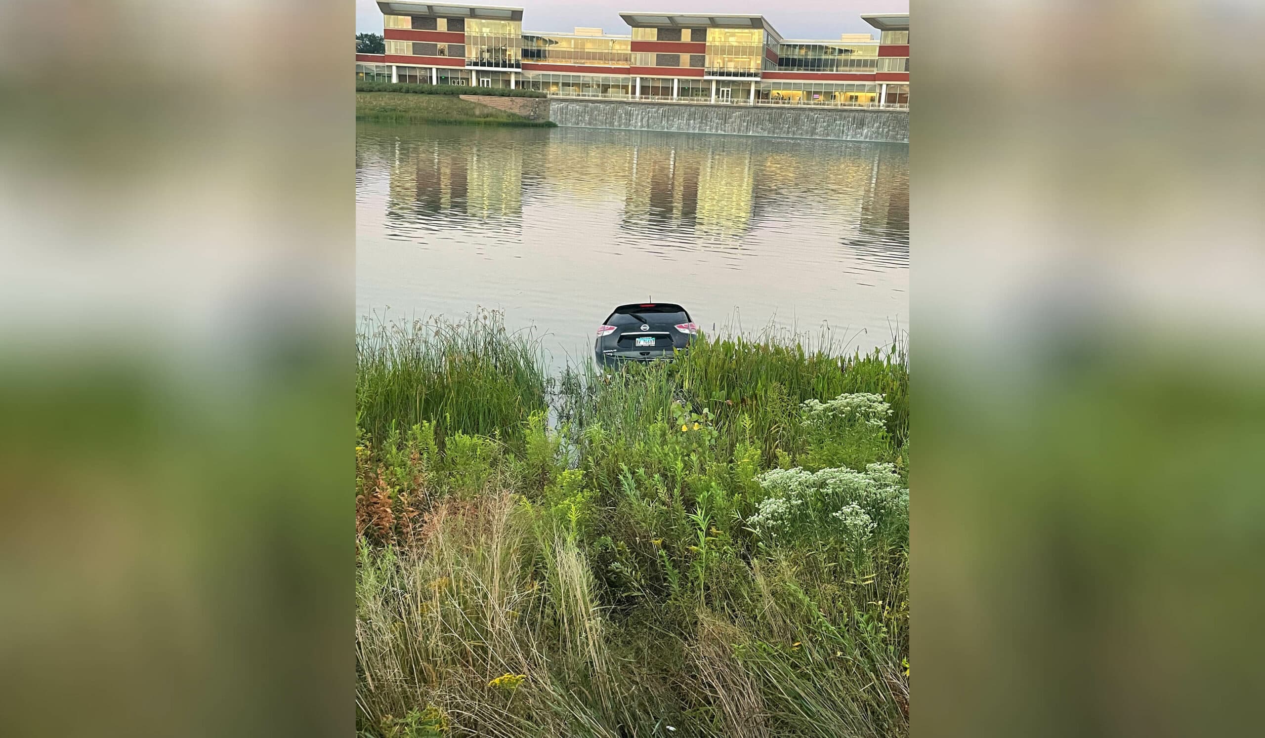 Woman uninjured after pushing her car into pond at Northwestern