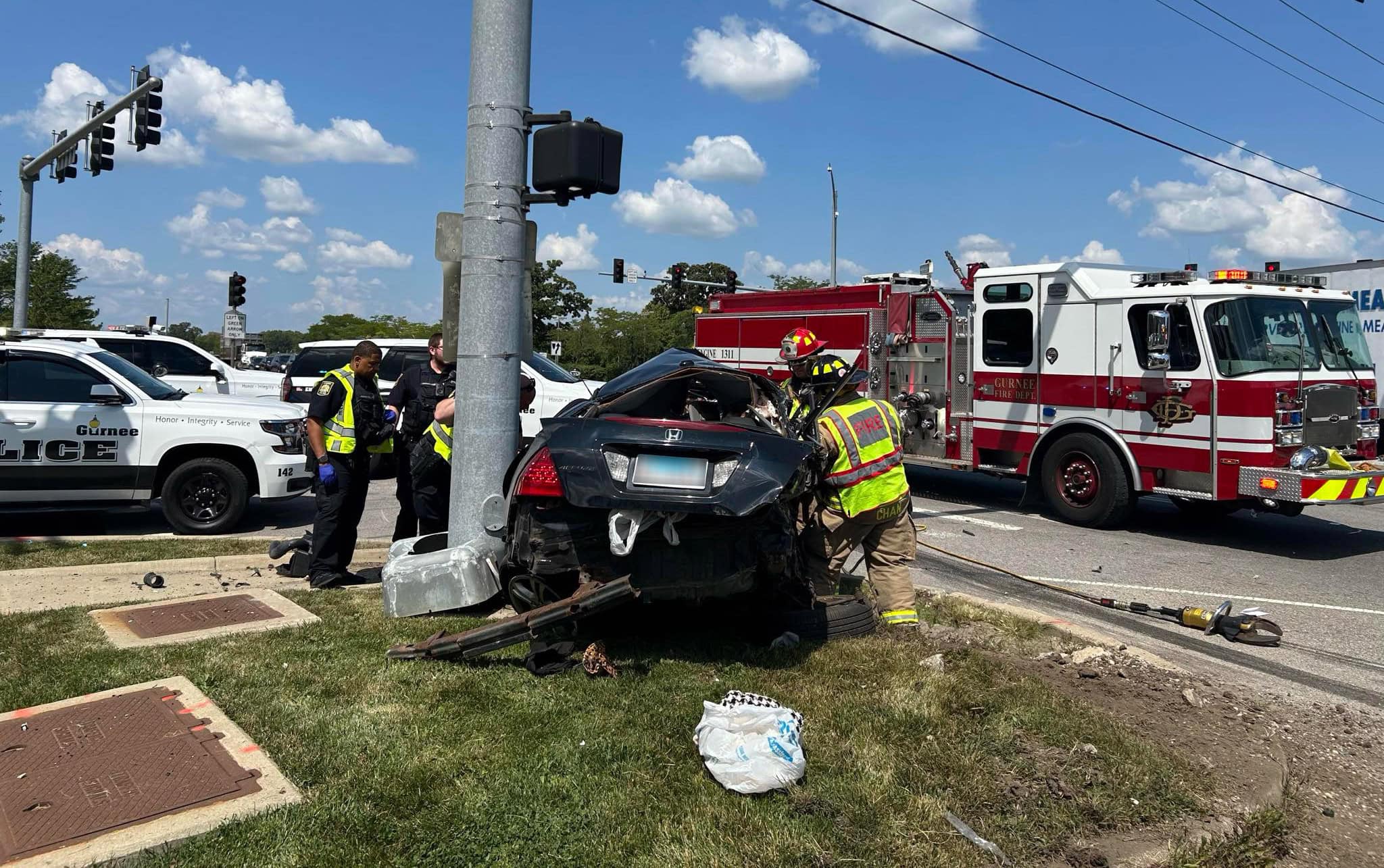 Woman dies after being trapped in car hit by semi-truck on Route 41 in Gurnee